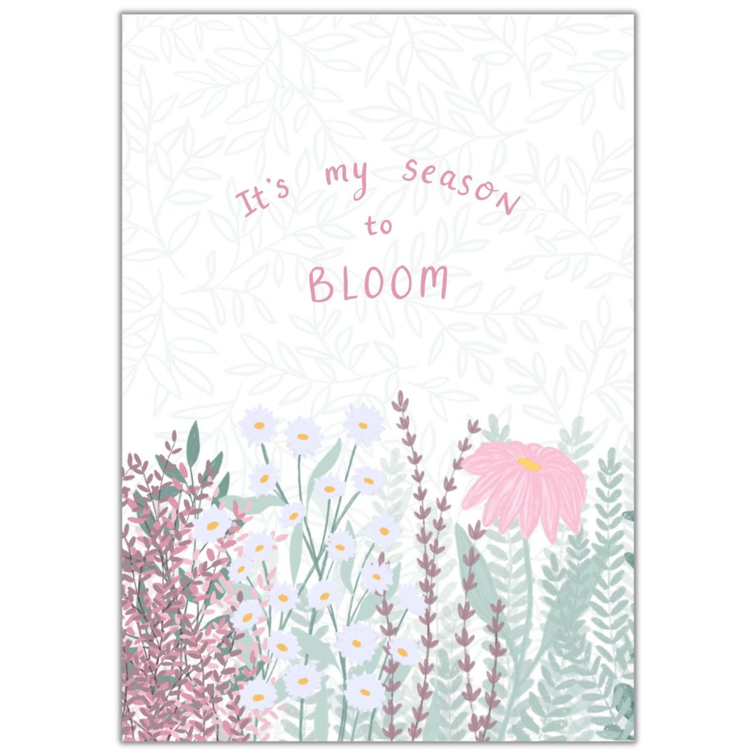 Irish botanical art print with the words It's my season to bloom written across the middle in a dusty pink hand writing. Underneath the writing is a meadow full of wildflowers and leaves in soft greens, whites, pink and yellow.