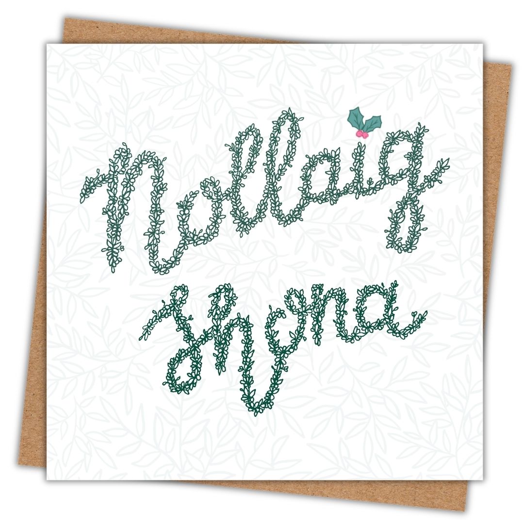 Irish language Christmas card with the words Nollaig Shona in a deep green. The lettering is made from a continuous vine of leaves and buds with a sprig of holly as the i in Nollaig.