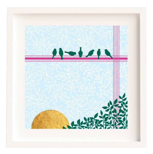 Framed artwork of 7 little birds sitting on a hot pink line across the top of the image. The background is pale blue with a delicate white leafy overlay. In the bottom left of the design is a gold sun. The sun is made from gold leaf. The illustration is mounted and framed in a white solid wood Irish made frame.