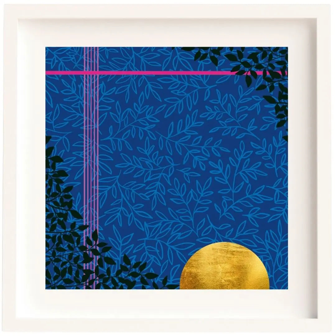 Framed artwork in a white mount and white solid wood frame. The illustration is mainly a deep moody blue background with a blue leaf pattern layered over it. In the top right and bottom left corners there is a triangle of deep green leaves. There are two line accents of hot pink for contrast and in the bottom right of the design there is a big bright semicircle of shiny gold leaf.