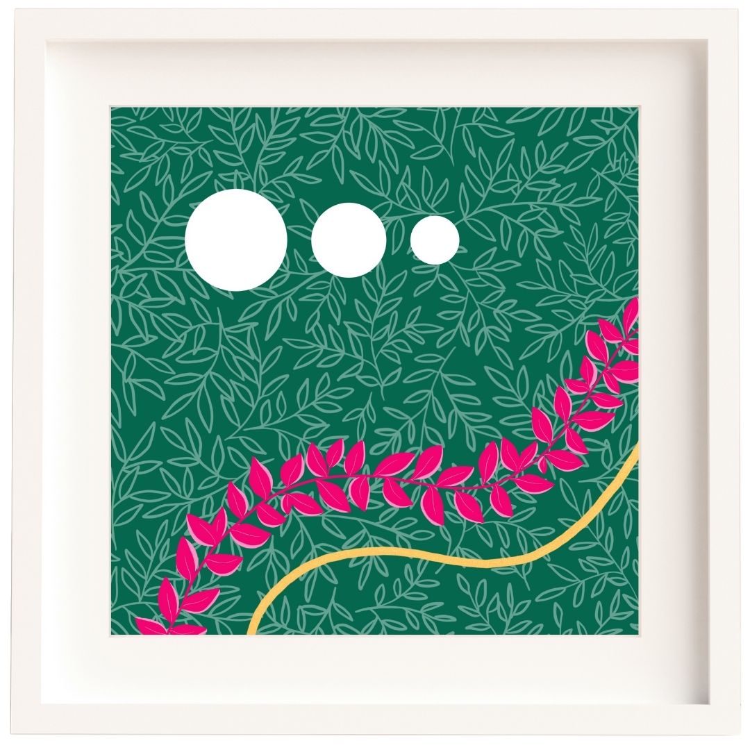 Framed artwork in a white wood frame and white mount. The illustration has three white circles going from big to small, left to right. Below them is a curved line of pink leaves from the mid right side of the print to the bottom left corner. In the same curve below that is a curved line of gold leaf. The background is a light green leaf outline pattern set into a dark green background layer.