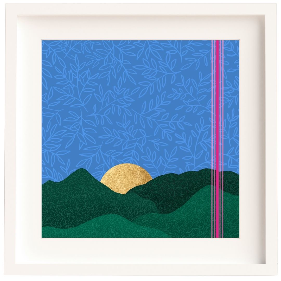 Framed Irish illustration of a sunset scene. The sky is a dusk blue in the background with a lighter blue leaf pattern softly layered on top to give the sky a velvety feel. There are rolling hills in shades of green with a bright gold sun setting behind them. The gold is made of gold leaf. There is a cluster of pink lines on the right side from top to bottom. Set in a white mount and a solid wood white frame.